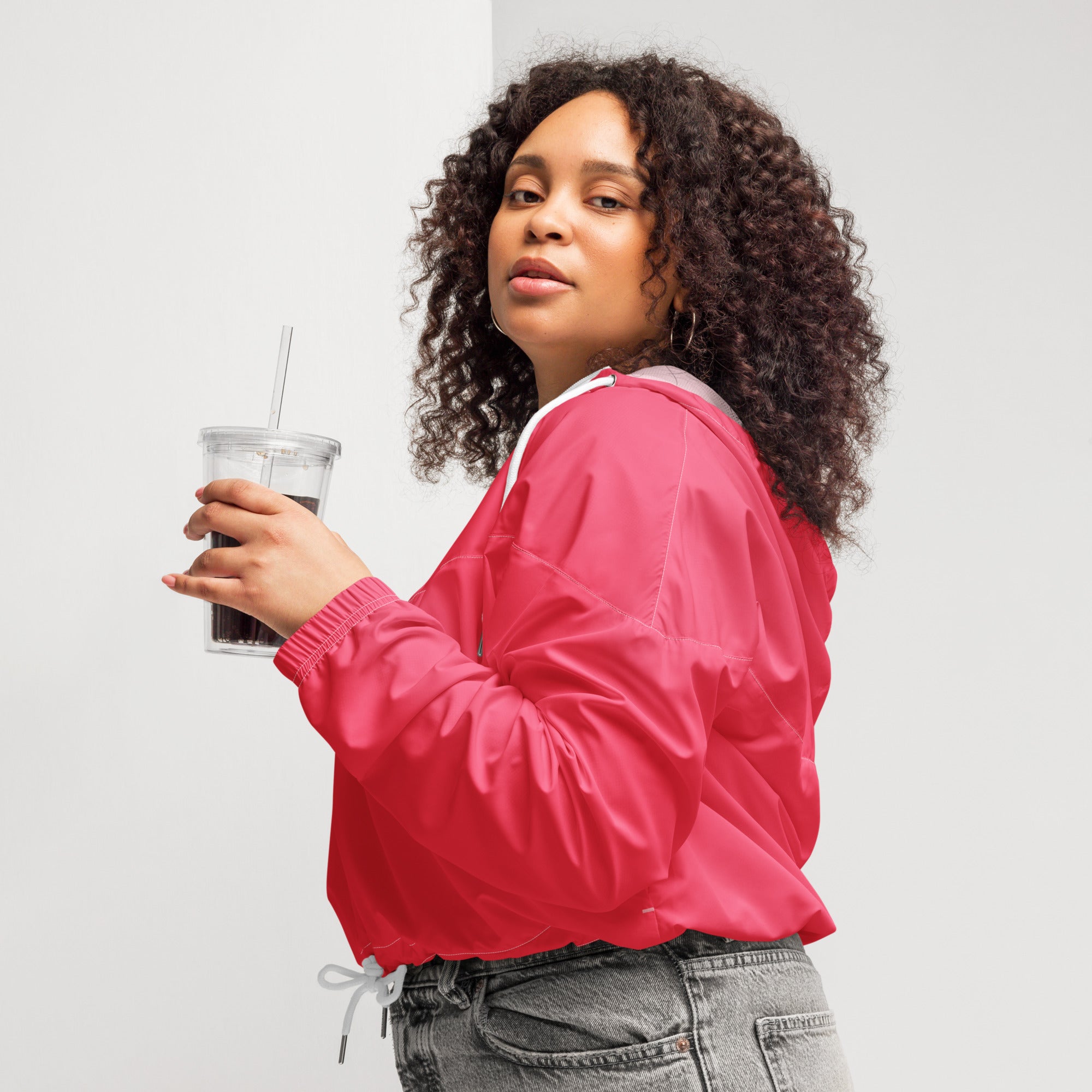 Women’s bright pink cropped windbreaker with white trim drawstring lightweight water resistant jacket with hood pockets