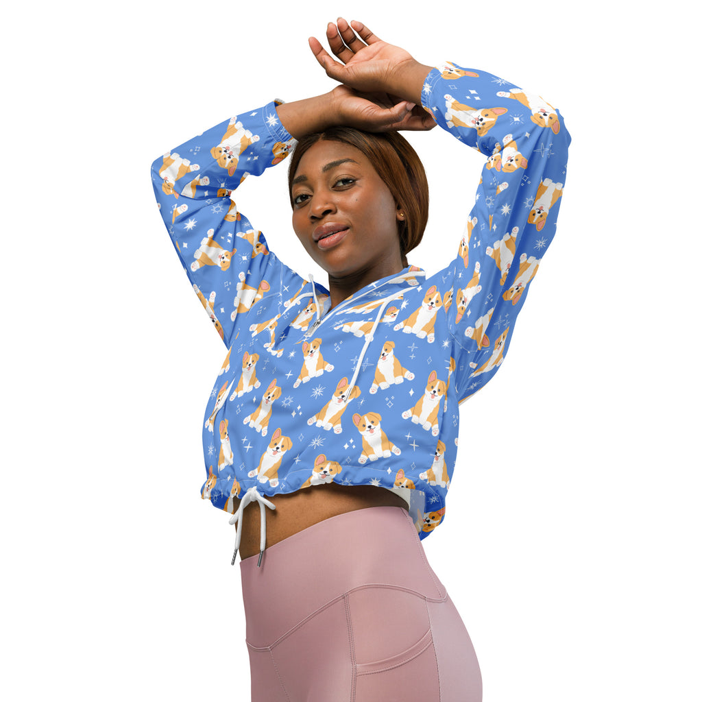 Women’s blue lightweight water resistant cropped windbreaker with adjustable hood featuring tan and white corgi pattern