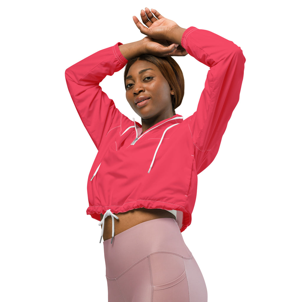 A vibrant pink cropped lightweight water resistant windbreaker jacket with white drawstrings and a half-zip front