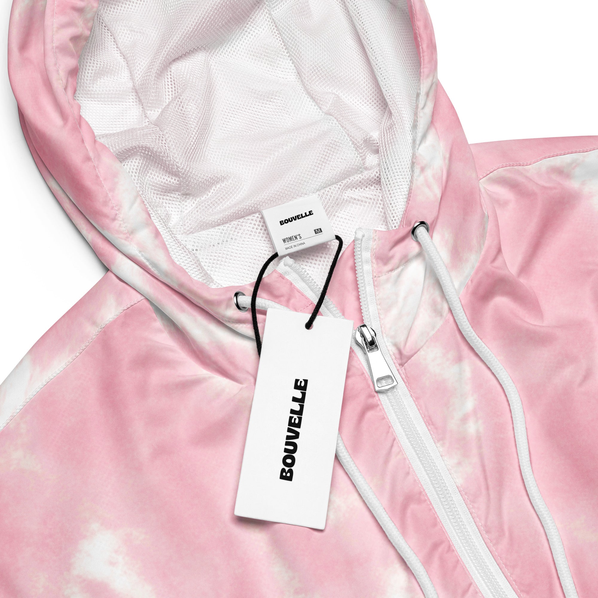 Women’s pink tie dye cropped windbreaker with white zipper drawstrings and mesh lined hood lightweight and water resistant
