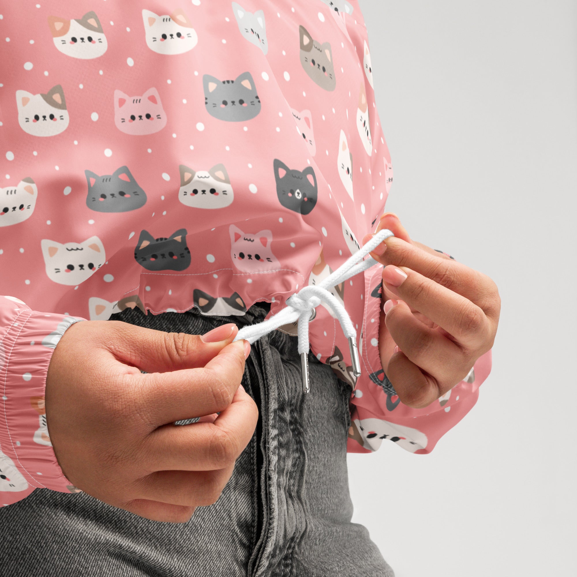 Women’s cute pink cat faces cropped windbreaker with playful cartoon cat pattern lightweight water resistant jacket