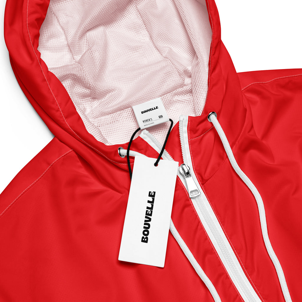 Women’s red cropped bouvelle hooded jacket with white zipper and mesh lining lightweight water resistant design