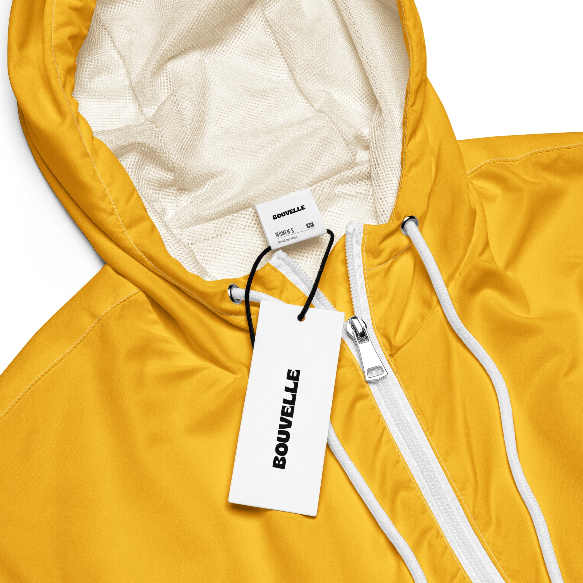 Women’s yellow cropped bouvvelle hooded windbreaker with white zipper and drawstrings lightweight and water resistant