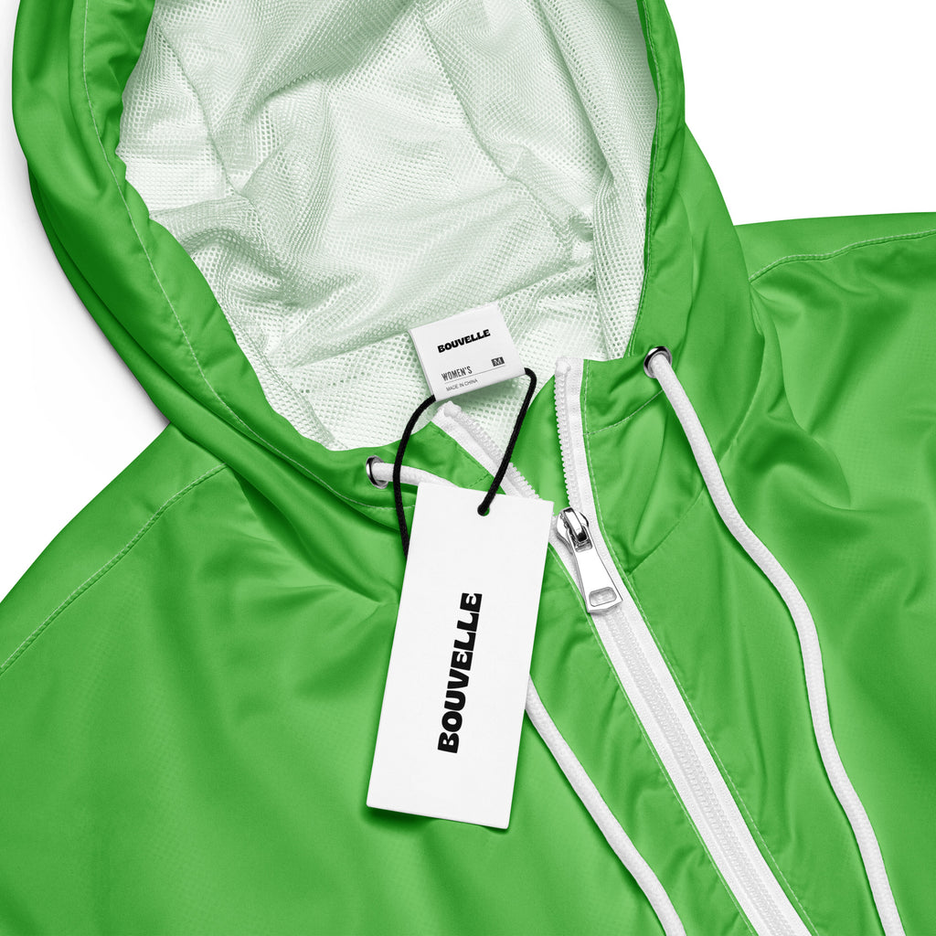Bright green bouvelle women’s cropped hooded jacket with white zipper and drawstrings lightweight and water resistant