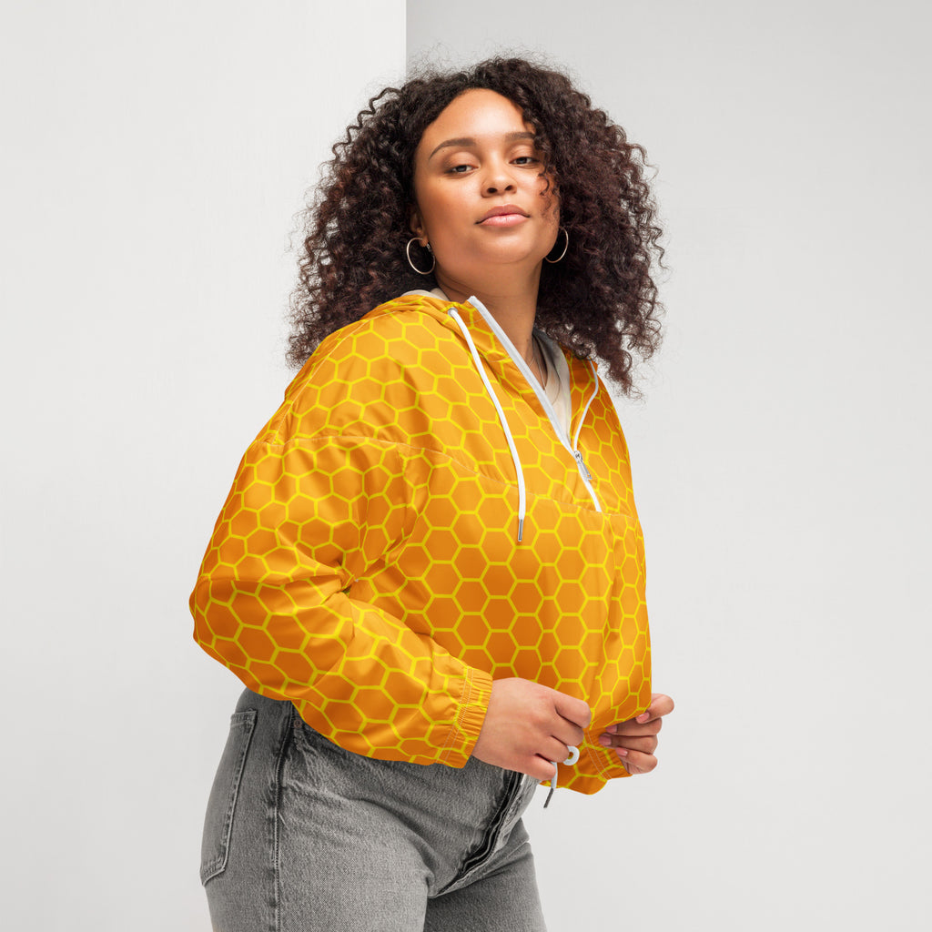Women’s vibrant yellow honeycomb cropped windbreaker with bold pattern white drawstrings lightweight water resistant jacket