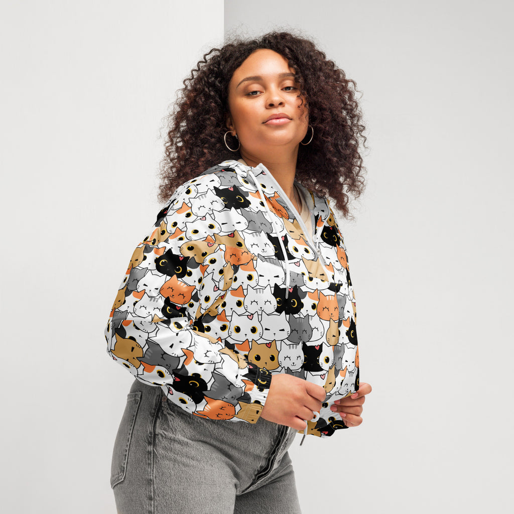 White cropped lightweight windbreaker with adjustable hood featuring black orange gray and white cartoon cat faces