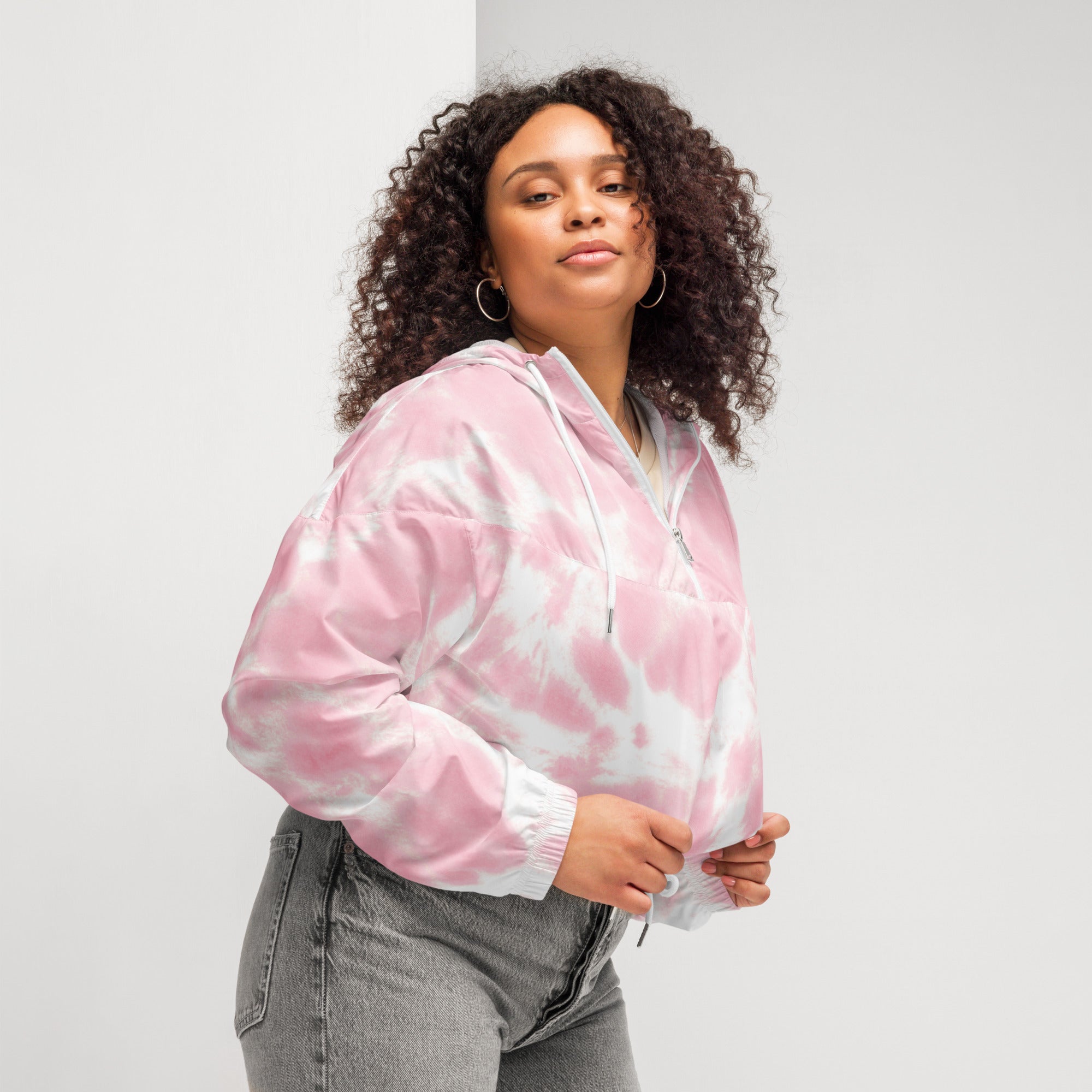 Women’s pink and white tie dye cropped bomber jacket with zipper front and adjustable hood for lightweight wind protection