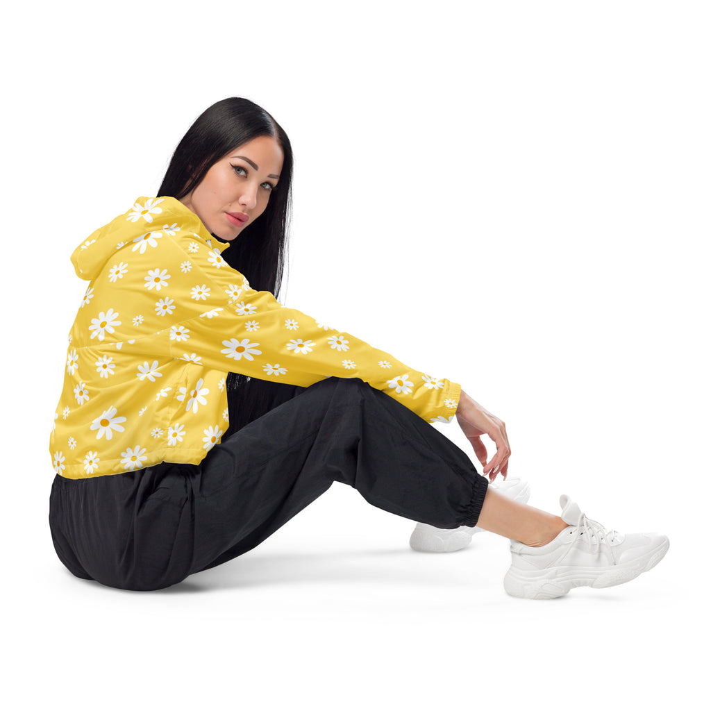 Women’s yellow daisy cropped windbreaker featuring a lightweight water-resistant fabric with adjustable hood and pockets