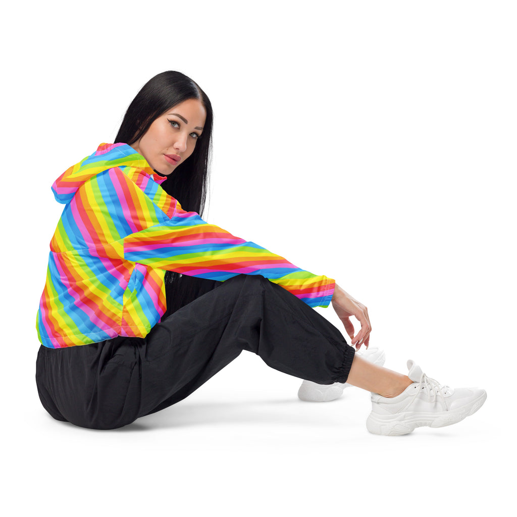 Women’s rainbow stripe cropped windbreaker with vibrant colors, lightweight glossy fabric, adjustable hood, and pockets