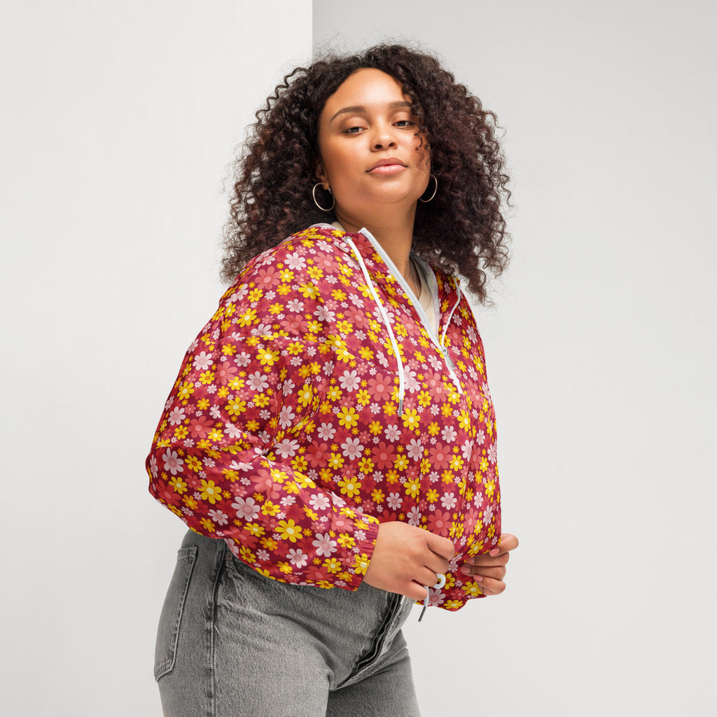 Women’s red floral cropped windbreaker with vibrant red and yellow print white drawstrings lightweight and water resistant