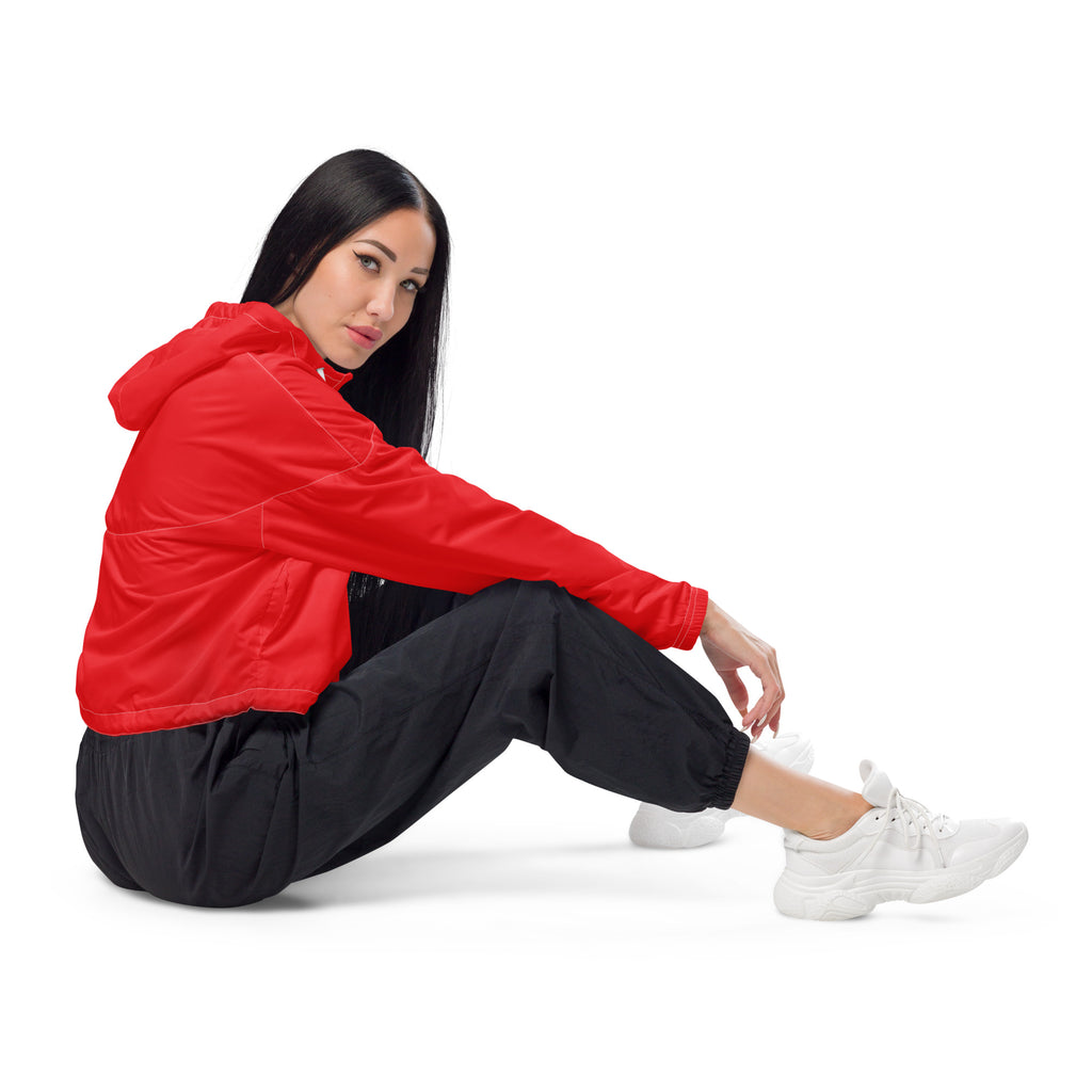 Women’s red cropped windbreaker jacket with lightweight hooded fabric and subtle seam detailing