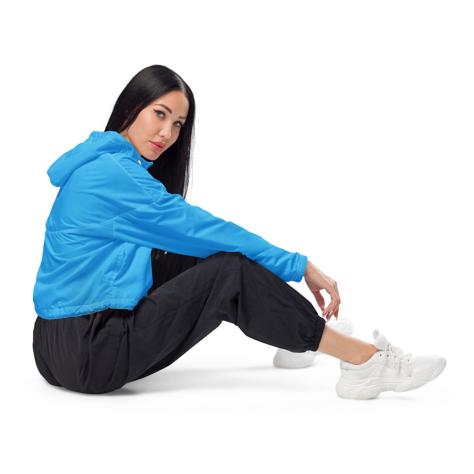 Women’s sky blue cropped windbreaker jacket with vibrant blue hood, lightweight design, and subtle seam detailing