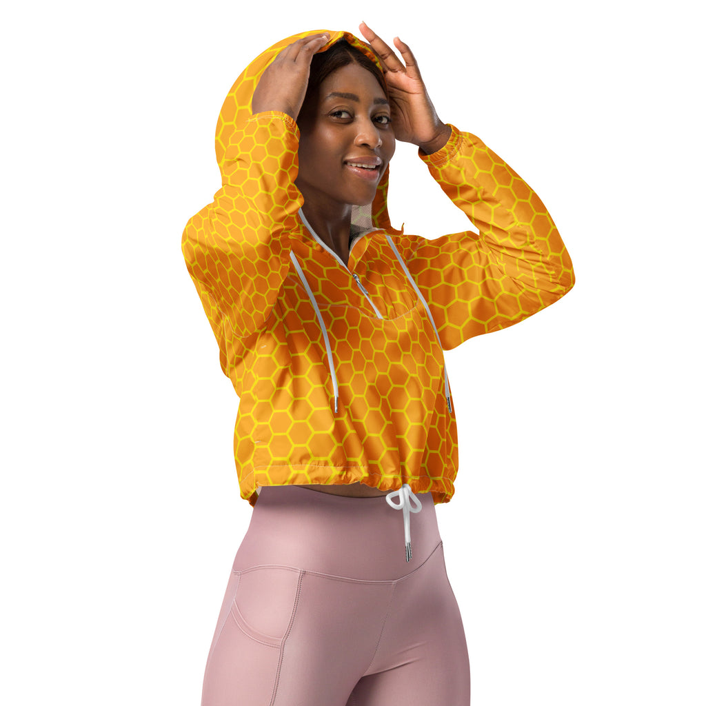 Women’s vibrant yellow honeycomb patterned cropped windbreaker with white drawstrings and front zipper pockets