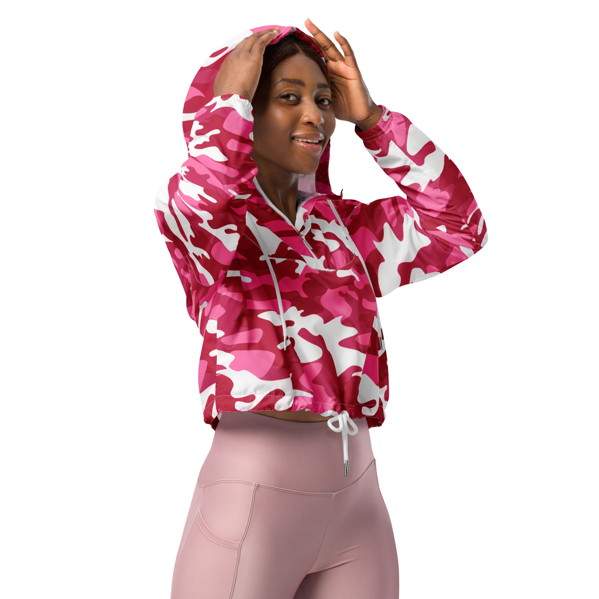A vibrant pink and white camouflage cropped hoodie with drawstring hood and elastic waistband for women