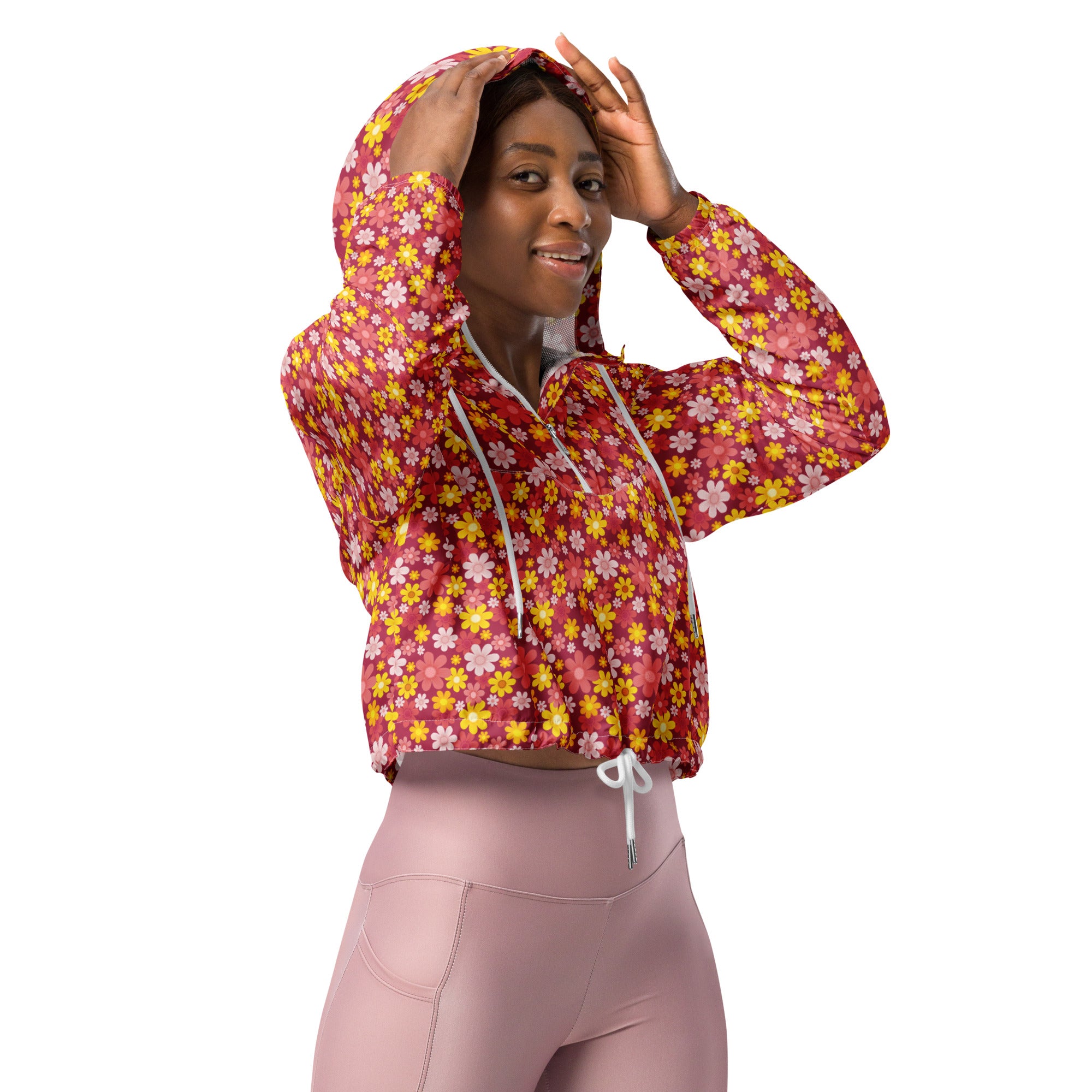 Women’s red floral cropped windbreaker with playful yellow and pink flowers, white drawstrings, lightweight and water resistant