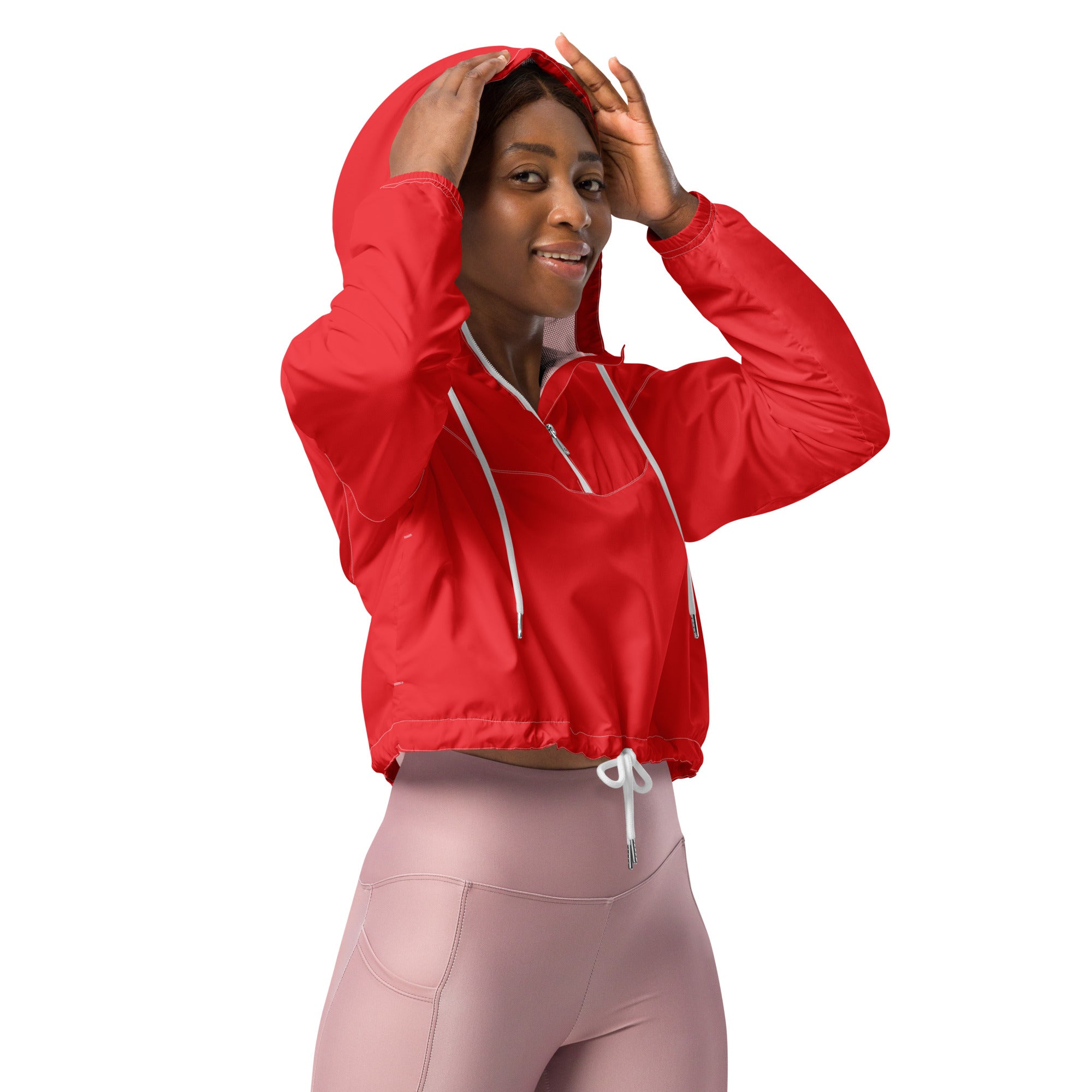Women’s red cropped windbreaker jacket with white drawstrings and zipper accents, lightweight and water resistant