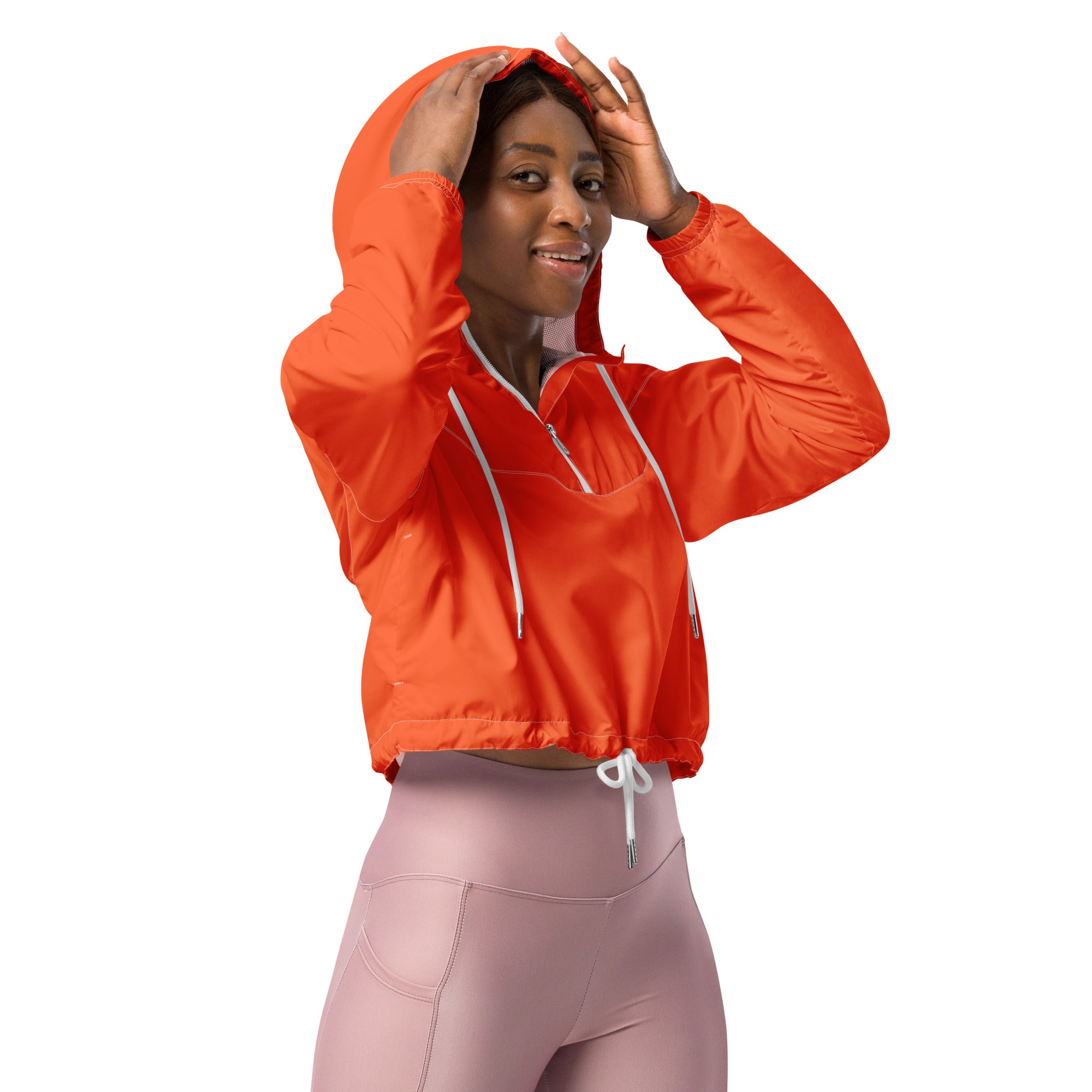 Women’s bright orange cropped hooded windbreaker with white drawstrings front zipper lightweight and water resistant