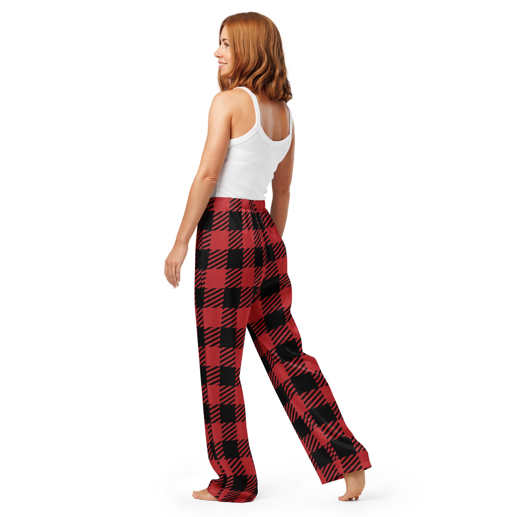 Women’s buffalo plaid pajama pants in red and black lightweight fabric with a relaxed wide-leg fit and drawstring waist