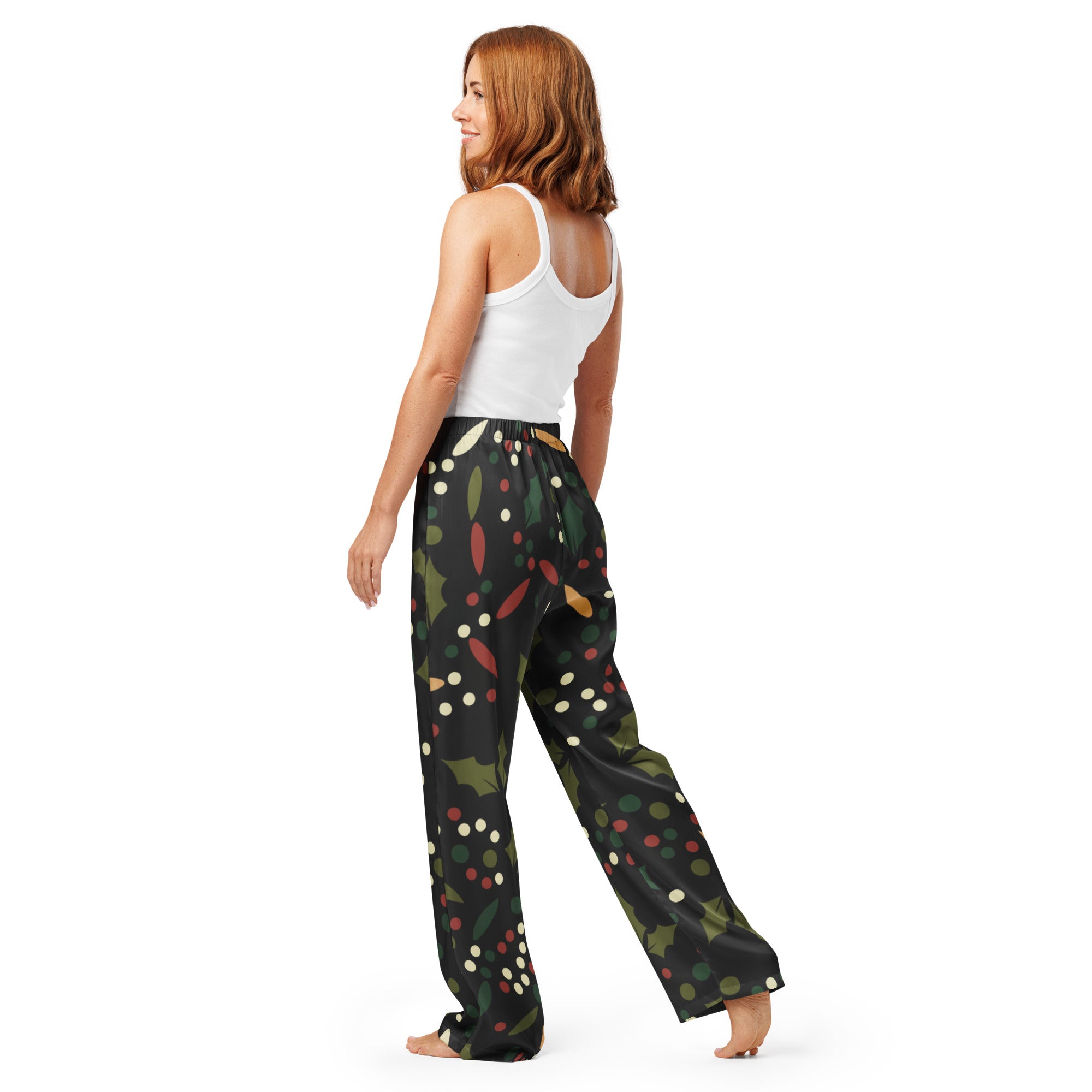 Women’s black wide-leg pajama pants with green red and white holly print lightweight relaxed fit with drawstring waist