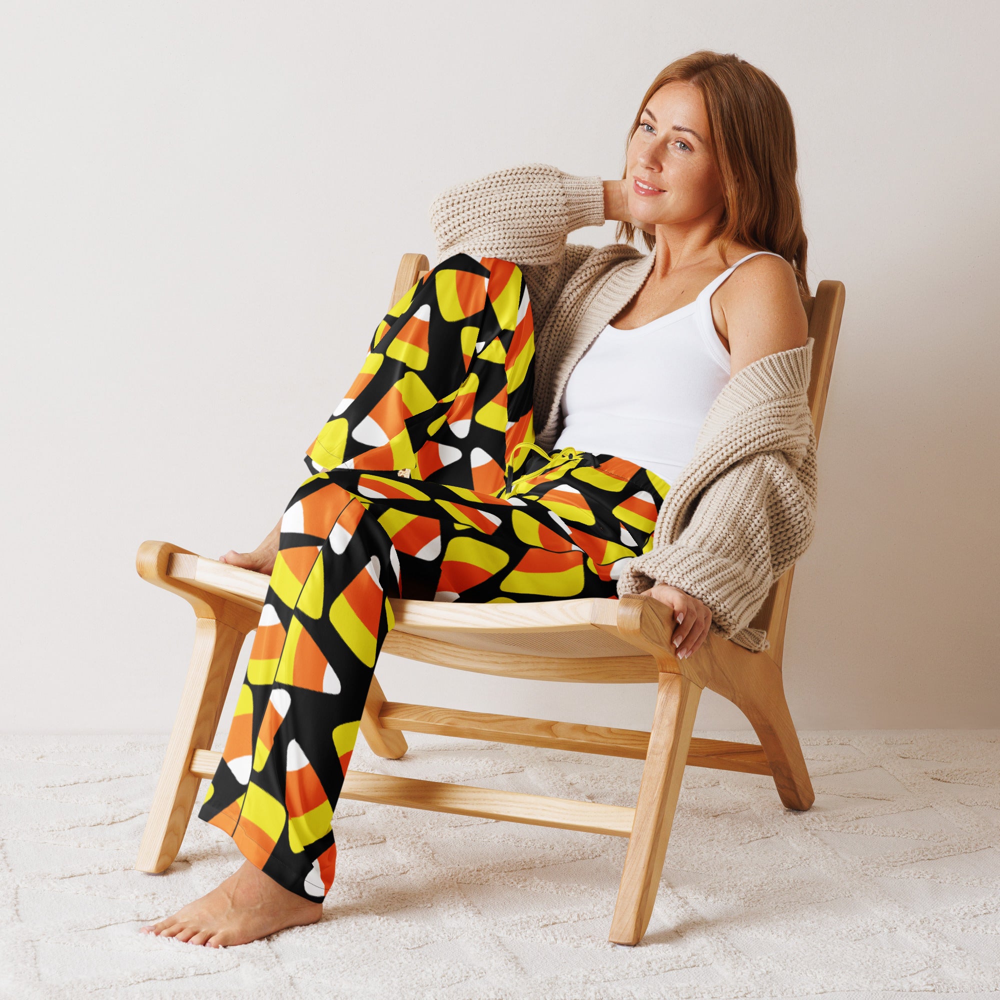 Women’s lightweight relaxed fit candy corn-patterned pajama pants in black orange and yellow with drawstring waist