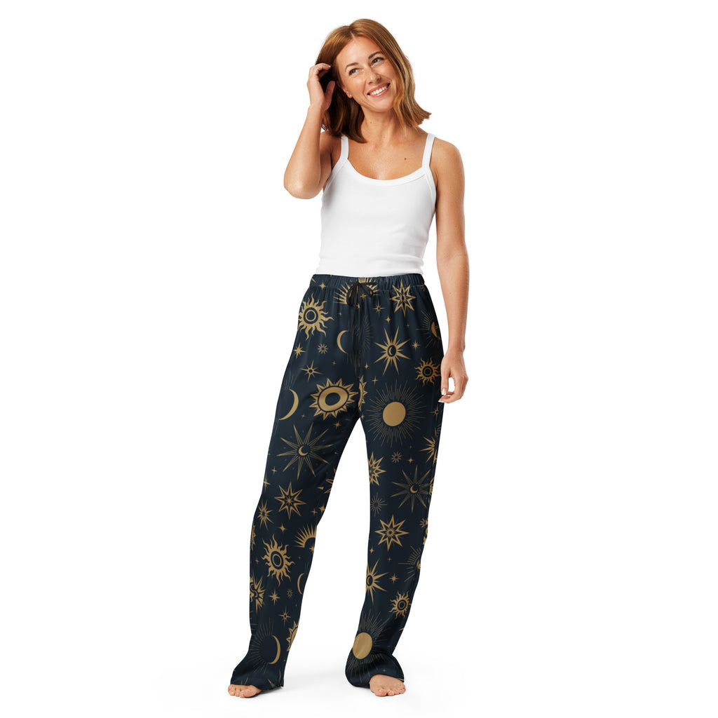 Women’s dark blue lightweight celestial sun and moon pajama pants with vibrant gold pattern and drawstring waist