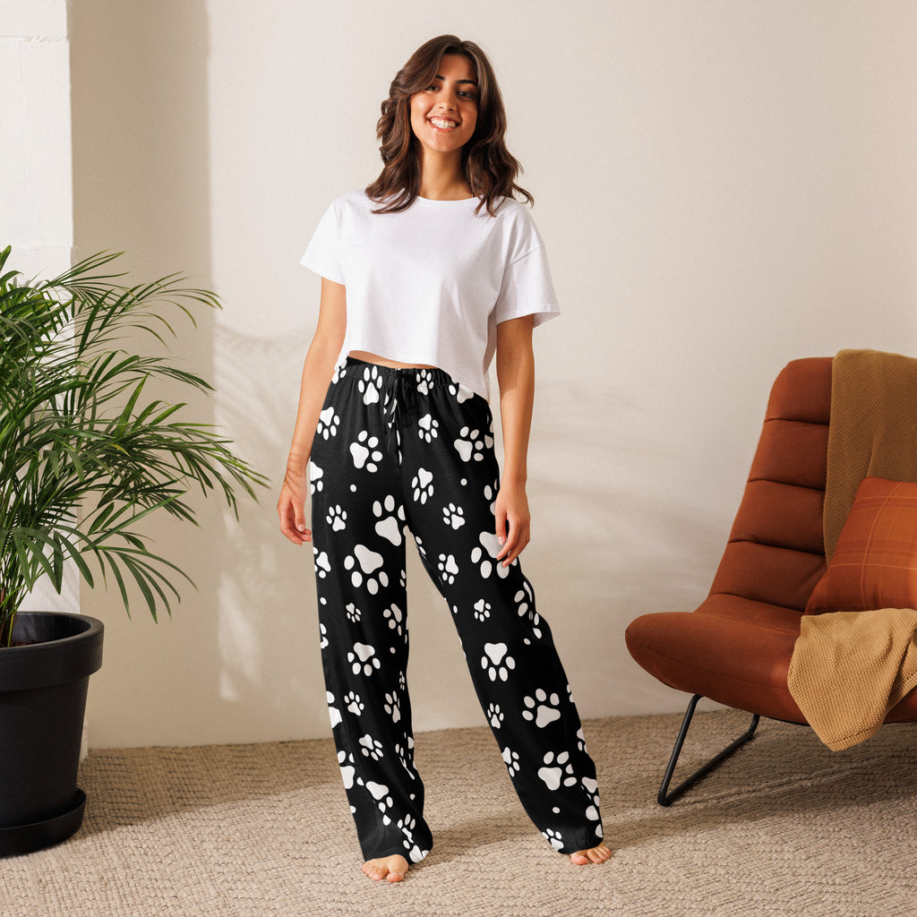 Women’s black lightweight pajama pants with white paw print pattern and relaxed fit drawstring waist for comfort