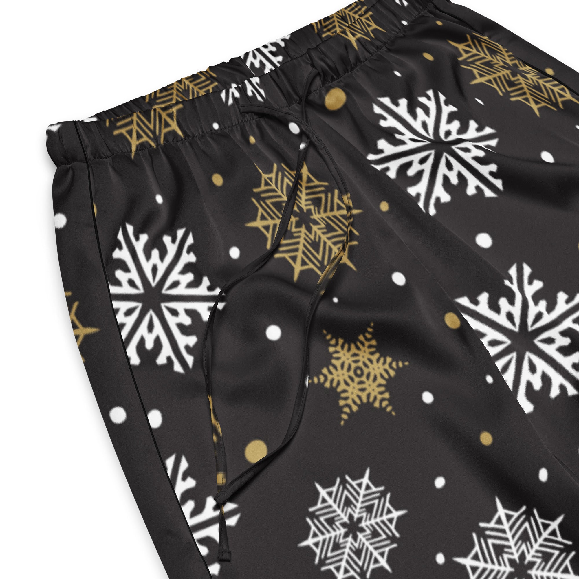Women’s black lightweight pajama pants with gold and white snowflake pattern and drawstring waist for relaxed fit
