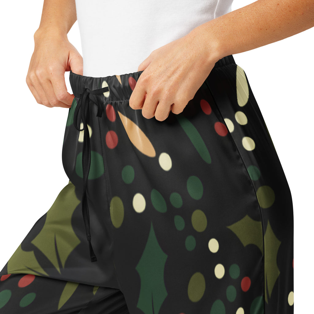 Women’s black lightweight holly print christmas pajama pants with green leaves red and cream berries and drawstring waist