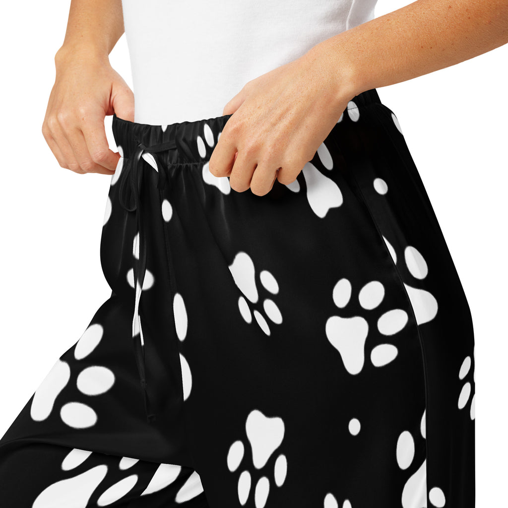 Women’s black lightweight pajama pants with white paw print pattern and elastic waistband for relaxed fit and comfort