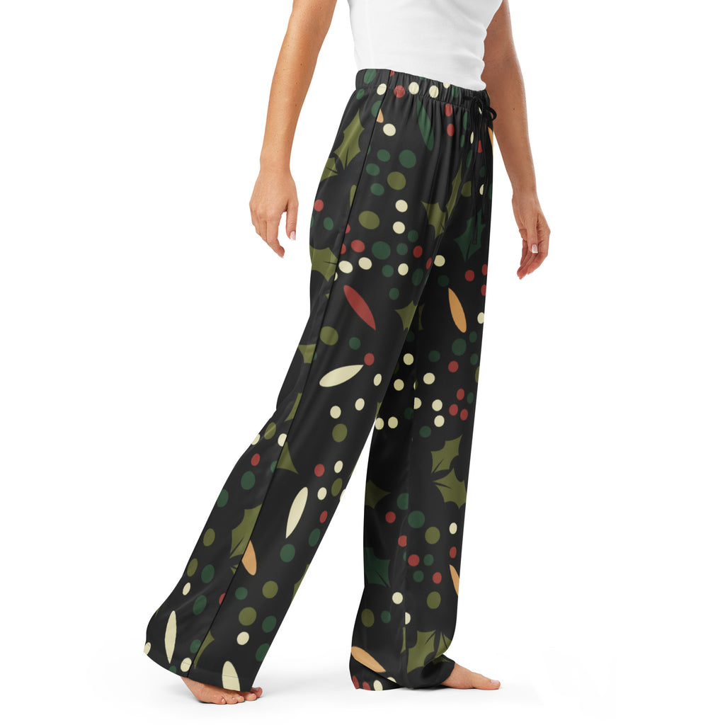 Women’s black wide-leg holly print christmas pajama pants with green leaves red berries and multicolored polka dots