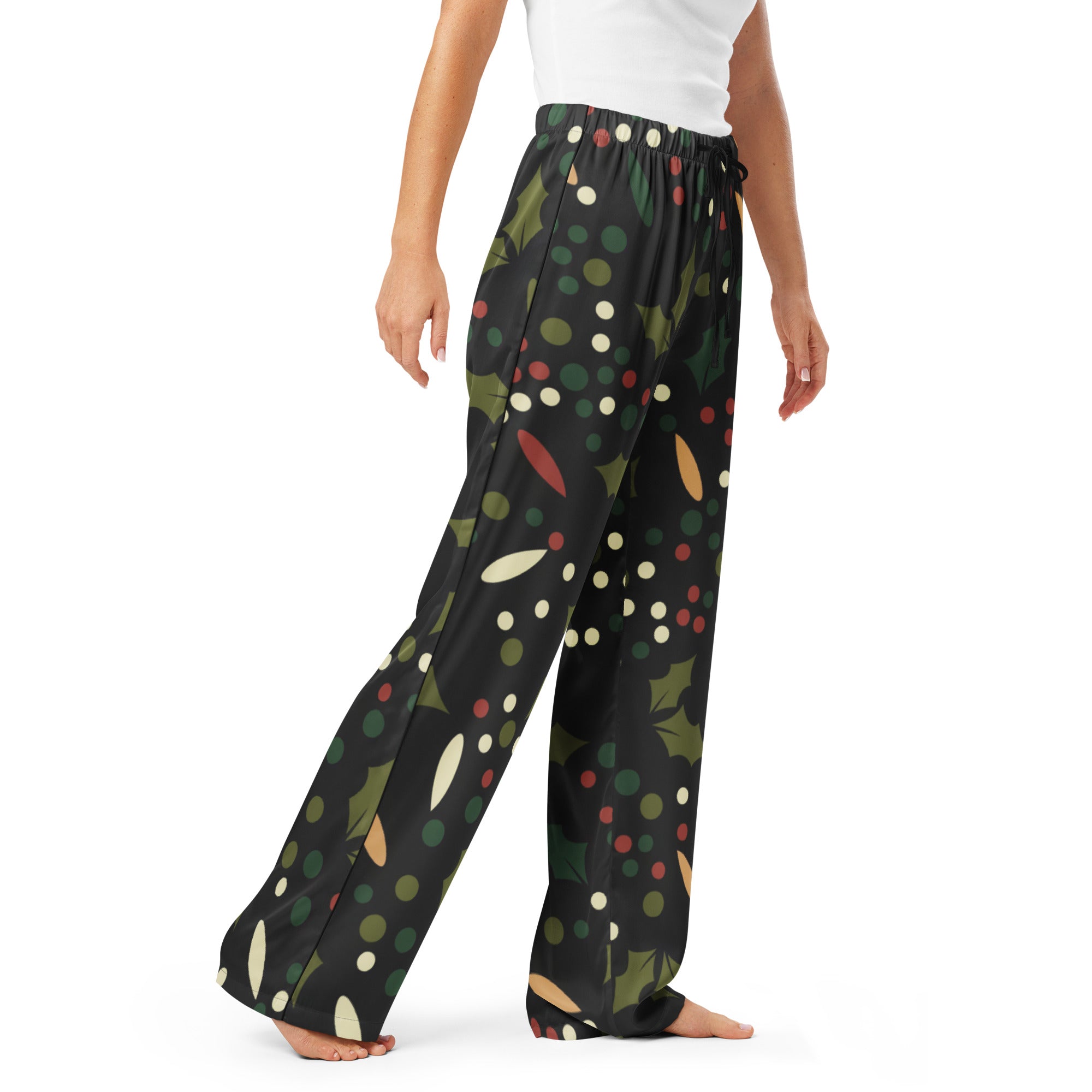 Women’s black wide-leg holly print christmas pajama pants with green leaves red berries and multicolored polka dots