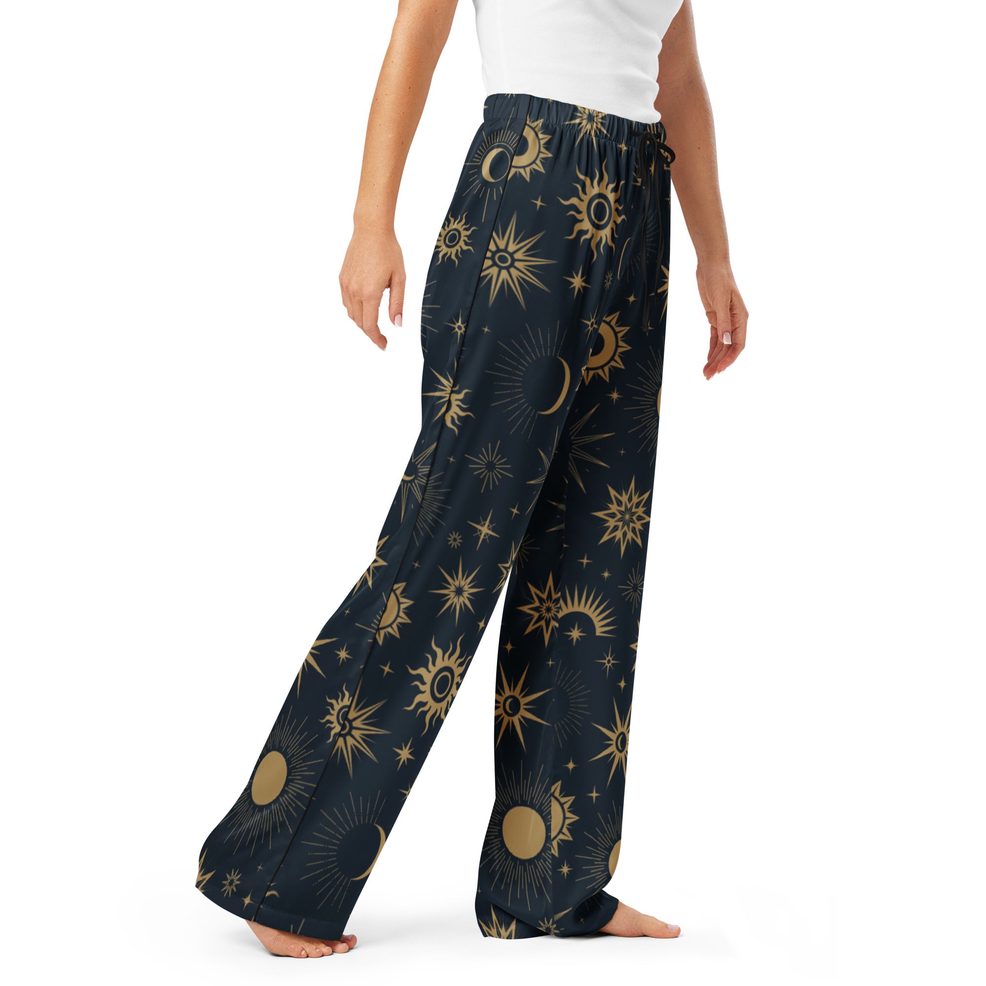 Dark blue wide-leg lightweight women’s pajama pants with gold celestial sun moon and star pattern and drawstring waist