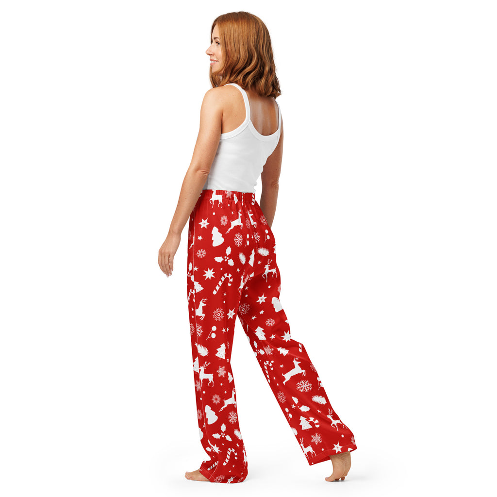 Women’s red lightweight Christmas pajama pants with festive white reindeer snowflakes and candy canes pattern and drawstring waist