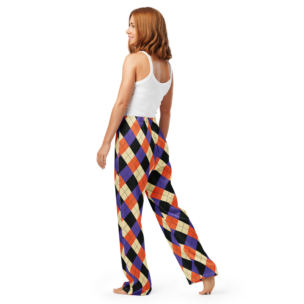 Women’s wide-leg Halloween argyle pajama pants with bold orange purple black and cream pattern lightweight relaxed fit