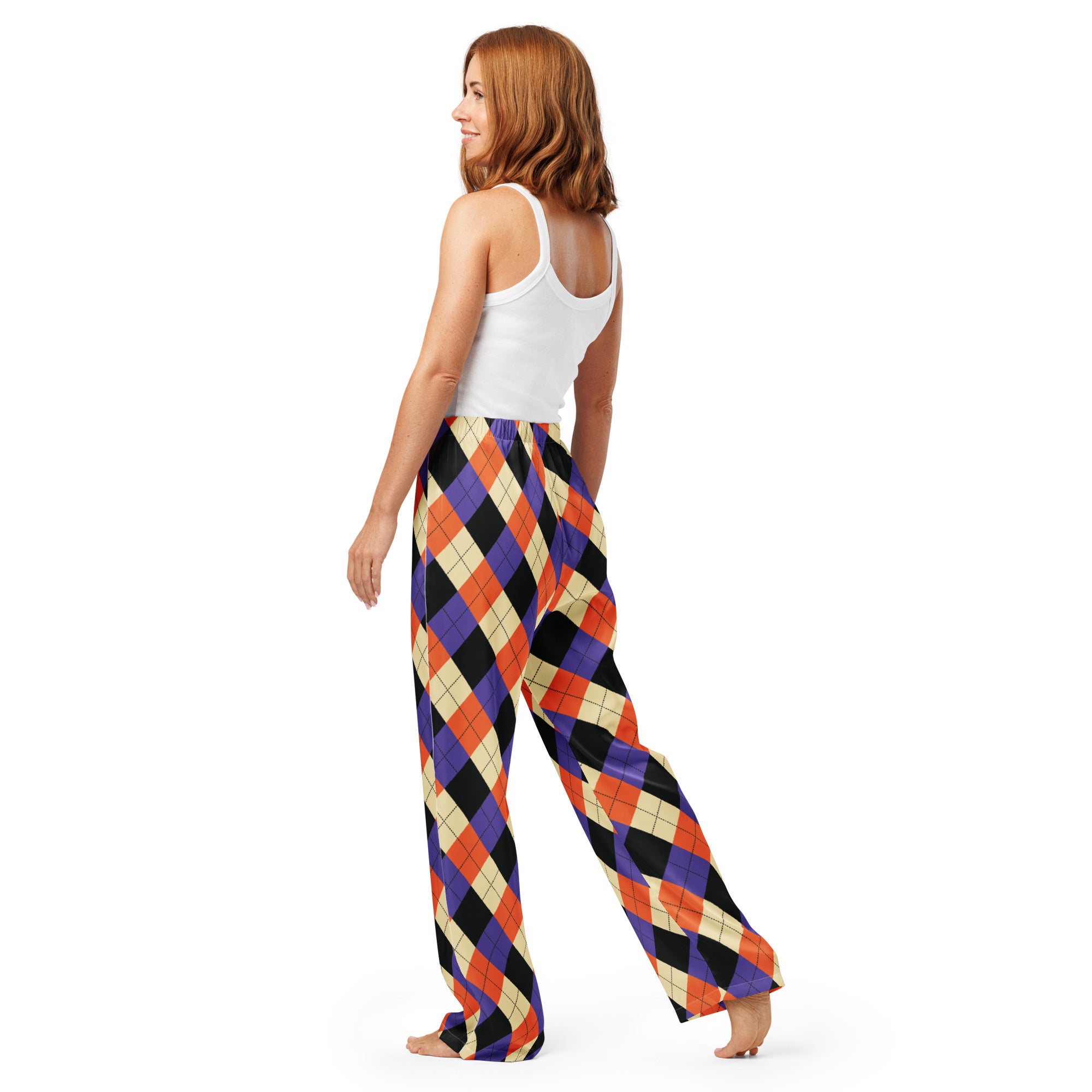 Women’s wide-leg Halloween argyle pajama pants with bold orange purple black and cream pattern lightweight relaxed fit