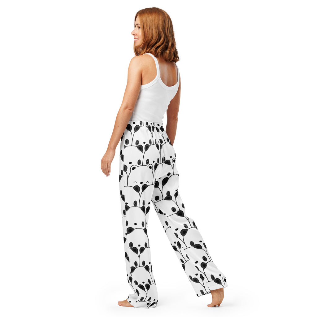Women’s white lightweight pajama pants with a relaxed fit and playful black panda face pattern and drawstring waist