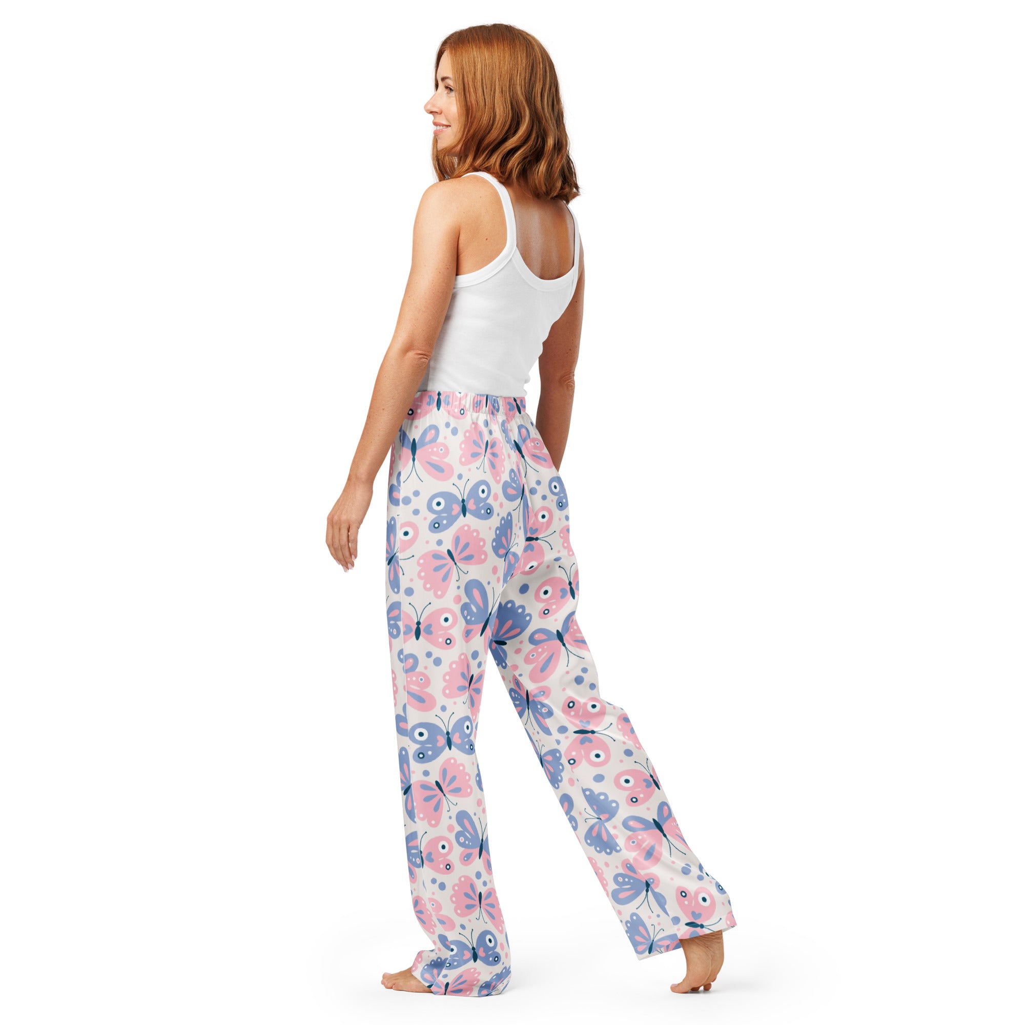 Women’s pink and purple butterfly pajama pants with lightweight fabric and relaxed fit drawstring waist