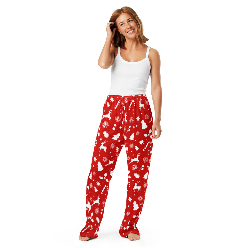 Women’s red lightweight pajama pants with festive white reindeer snowflakes candy canes and christmas trees pattern