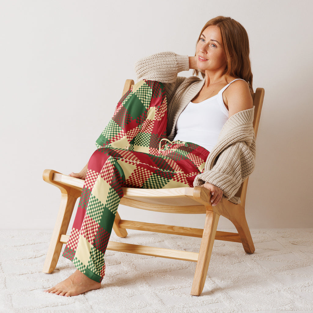 Woman wearing lightweight relaxed fit women’s Christmas plaid pajama pants in red green and beige with drawstring waist