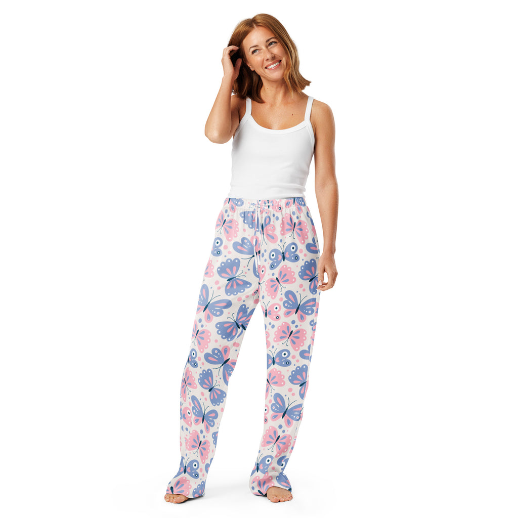 Women’s pink and purple butterfly-patterned pajama pants in lightweight soft flowing fabric with relaxed fit and drawstring waist