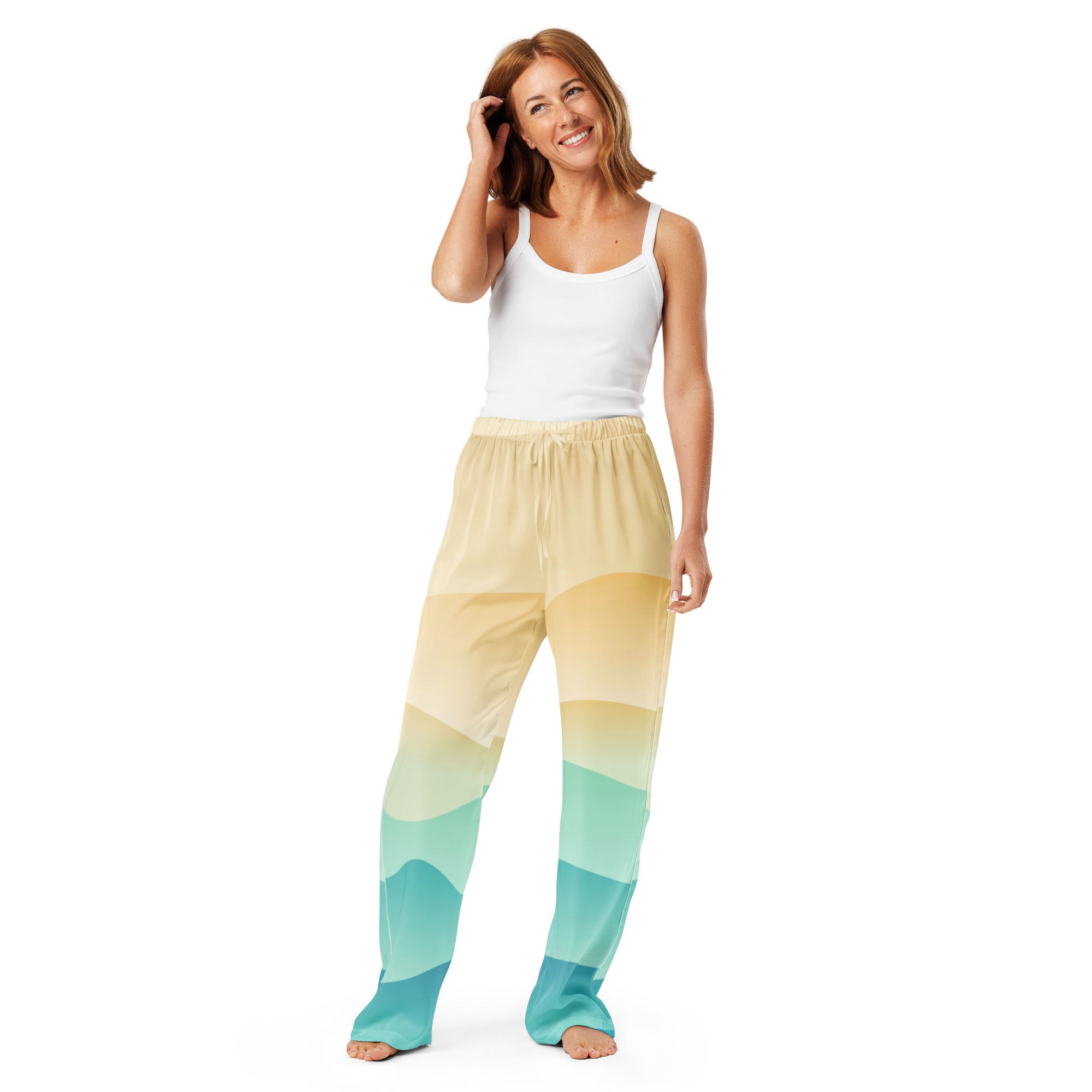Women’s ocean sunset wide-leg pajama pants with soft yellow to teal gradient and geometric wave pattern, lightweight with drawstring waist