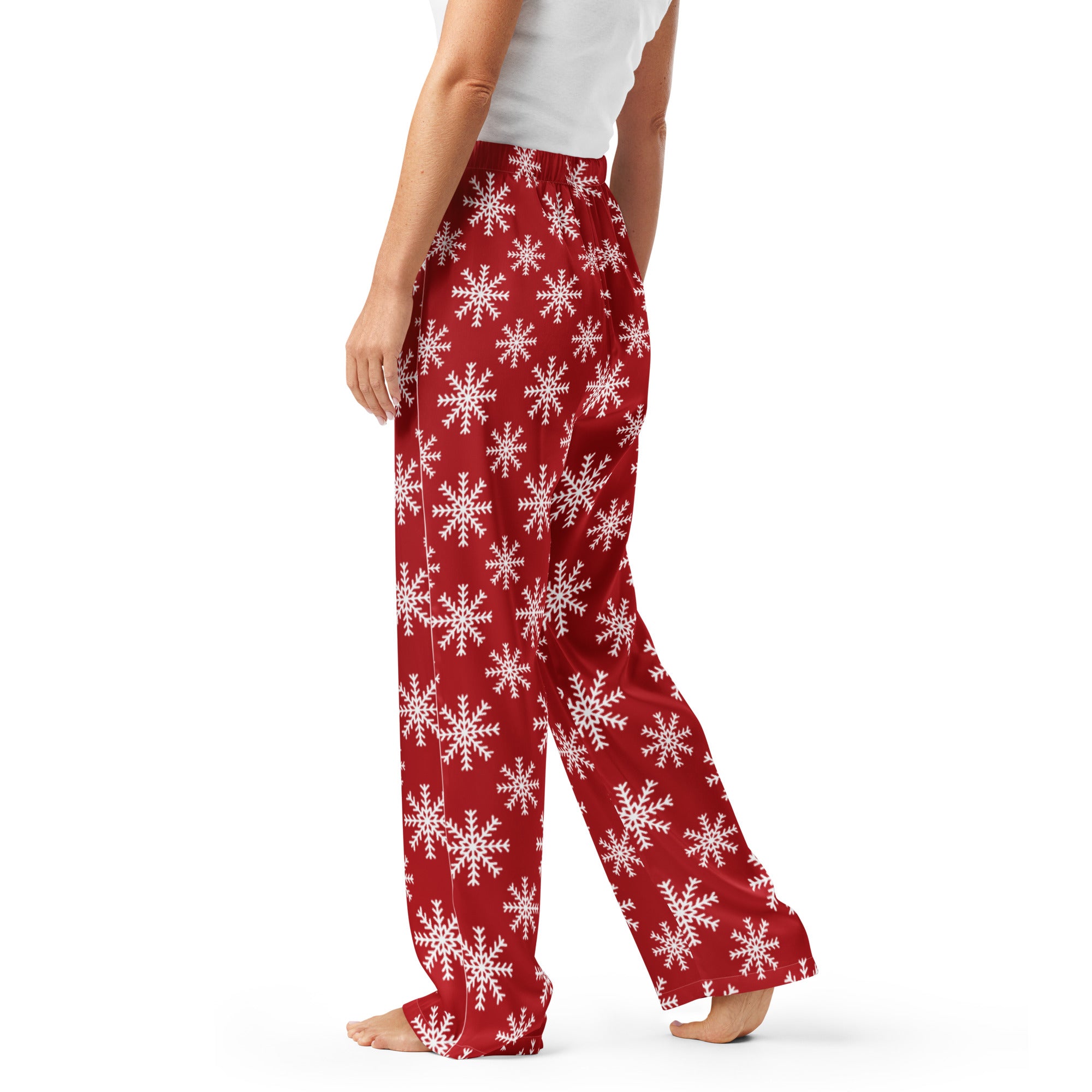 Women’s red lightweight pajama pants with white snowflake pattern and relaxed fit with drawstring waist for christmas