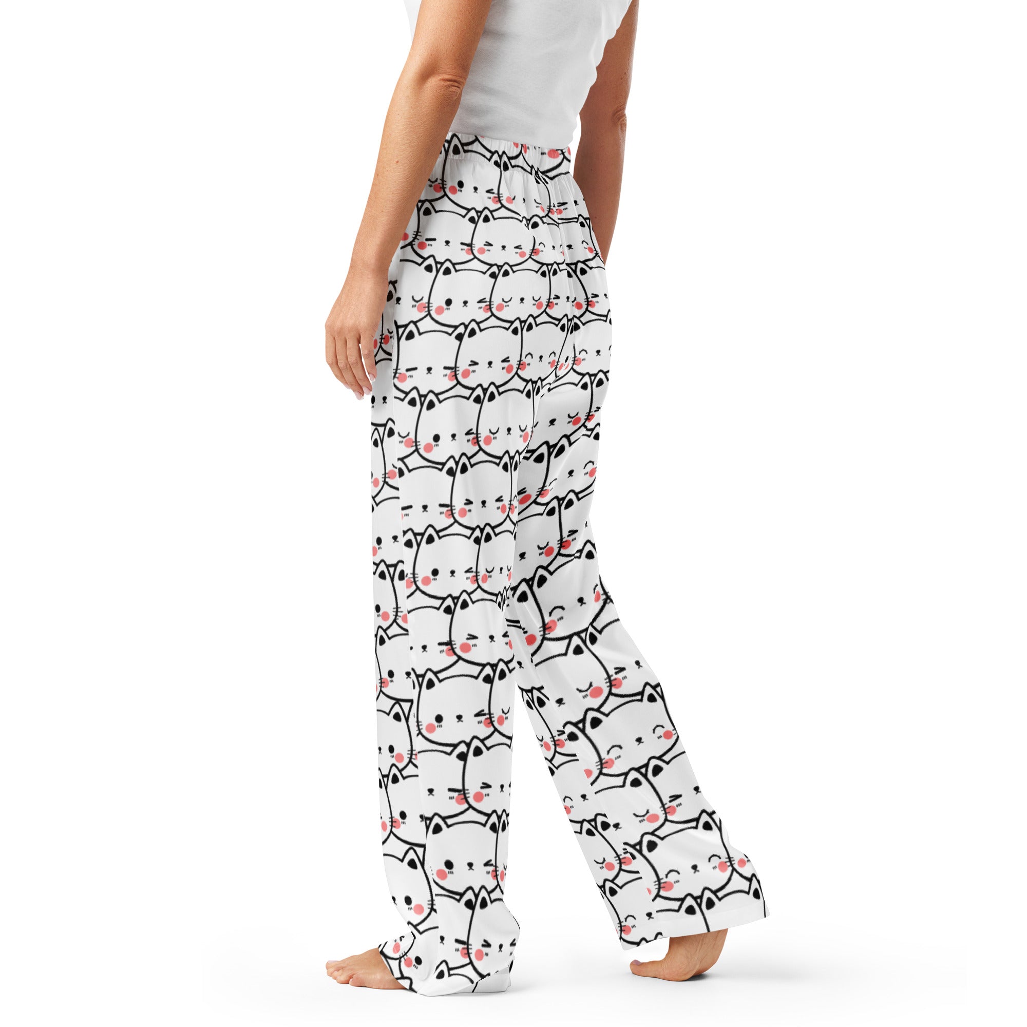 Women’s white lightweight pajama pants with black outlined cartoon cats and pink blush cheeks in a relaxed fit