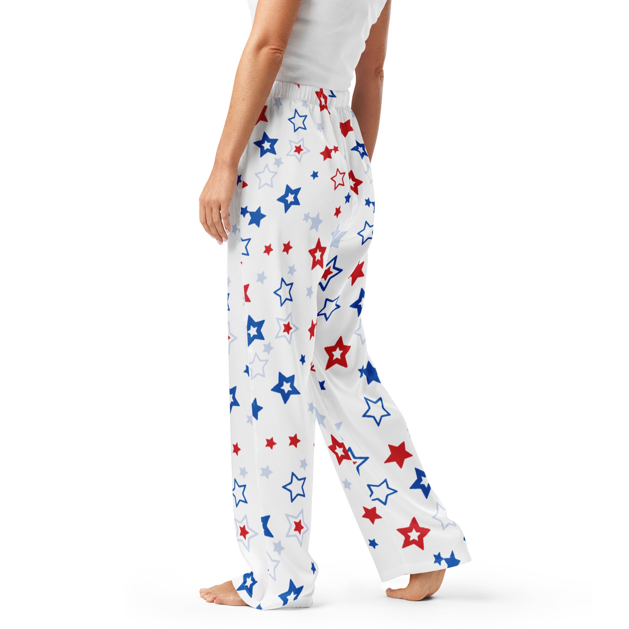 White lightweight women’s pajama pants with red blue and silver star pattern and relaxed fit with drawstring waist