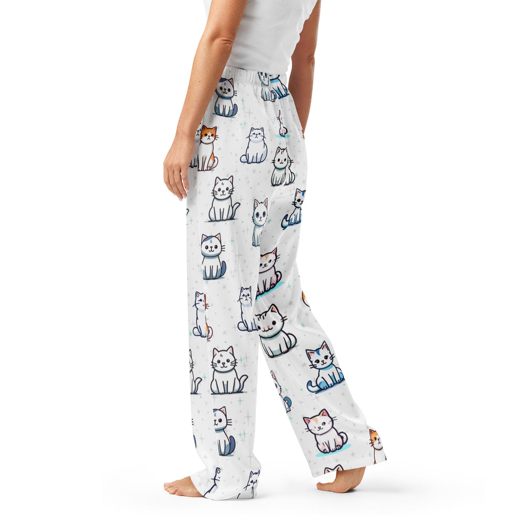 Women’s cute cat pajama pants in white lightweight fabric with colorful cartoon cat patterns and drawstring waist