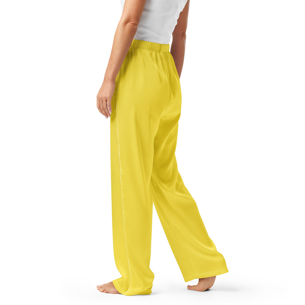 Women’s yellow pajama pants with bright yellow flowing wide-leg design and elastic waistband for lightweight comfort
