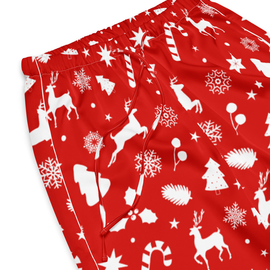 Women’s red lightweight cotton pajama pants with festive white reindeer snowflake candy cane pattern and drawstring waist