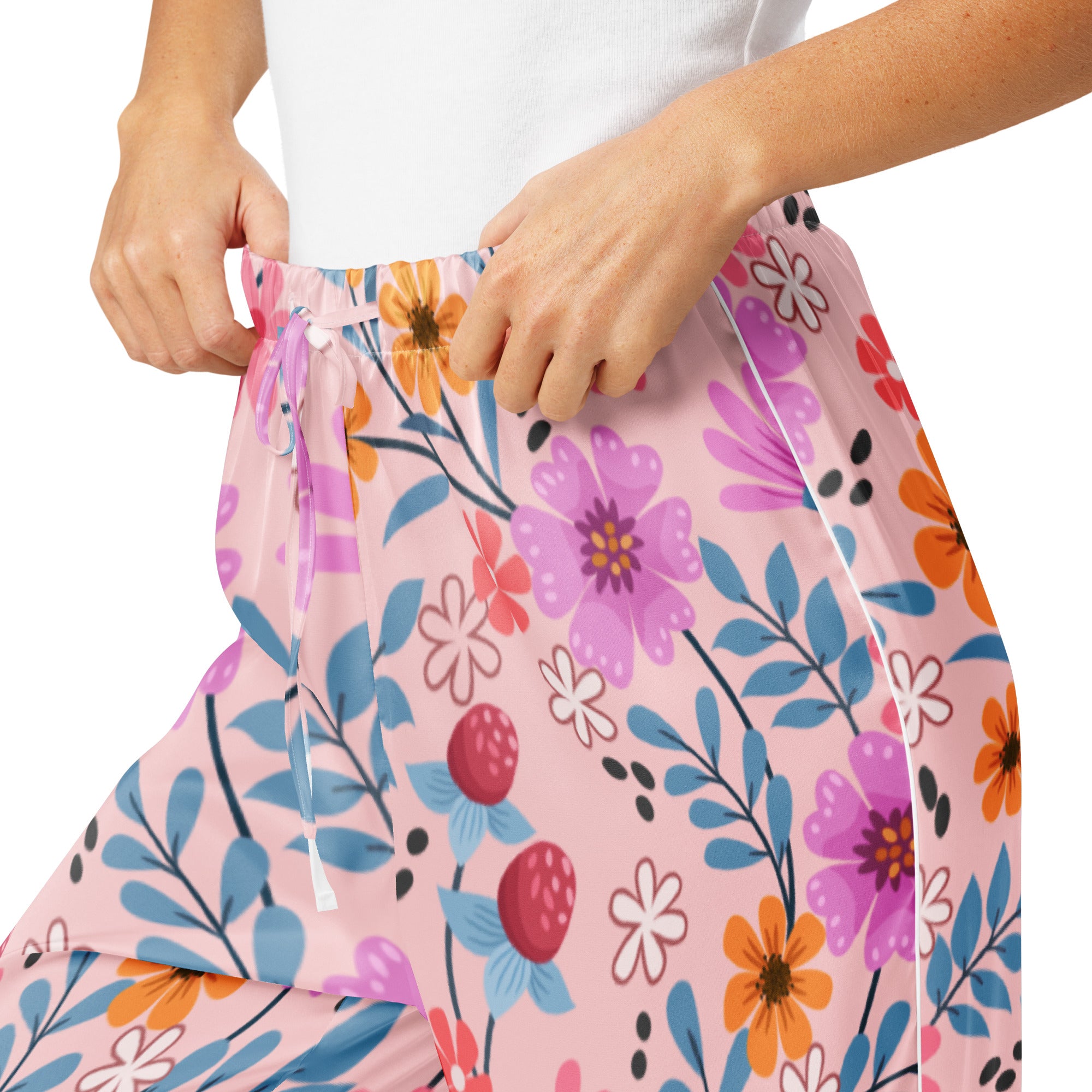 Women’s pink floral pajama pants with white trim lightweight relaxed fit and drawstring waistband for comfort