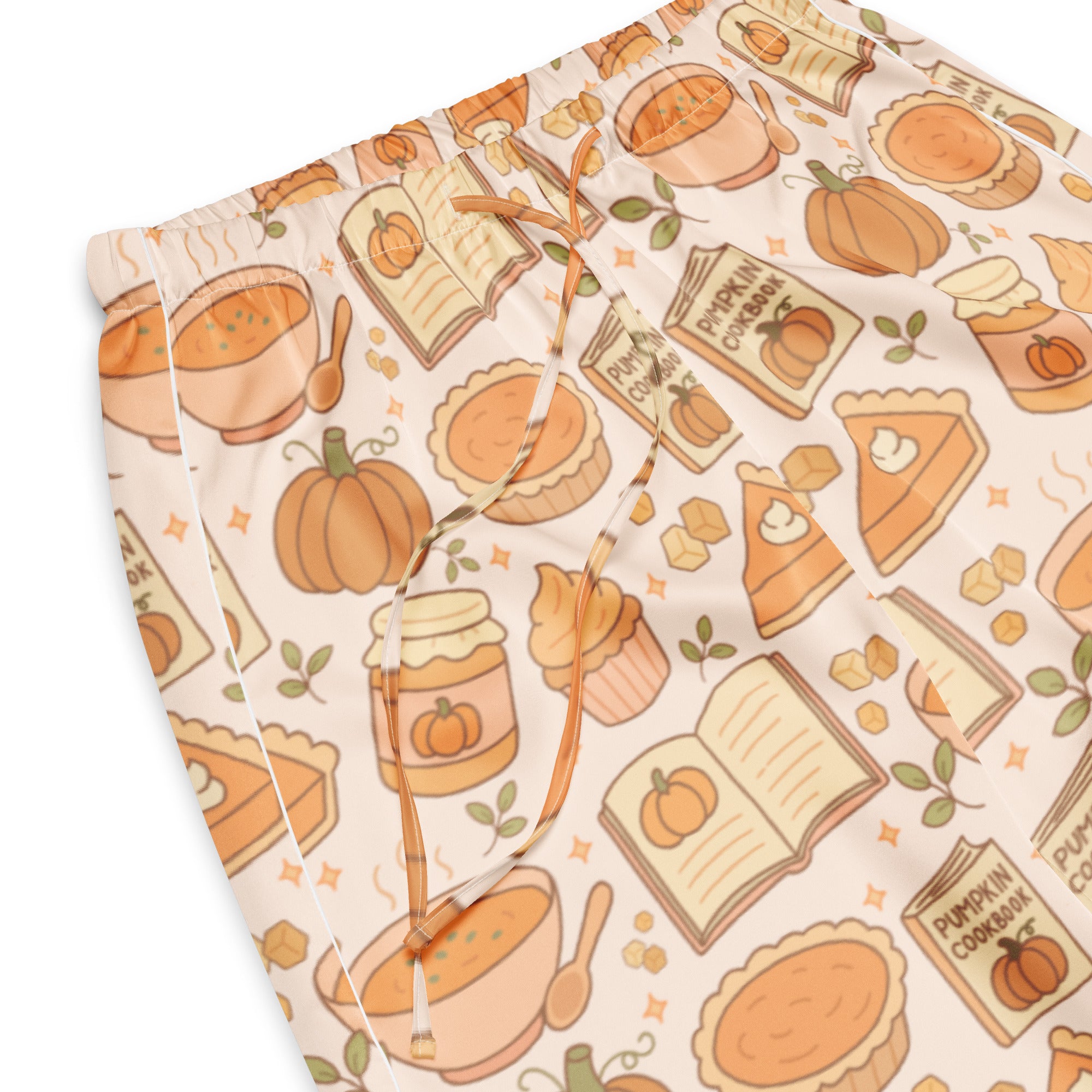 Cream-colored lightweight women’s pajama pants with a relaxed fit and autumn pumpkin pie themed pattern and drawstring waist