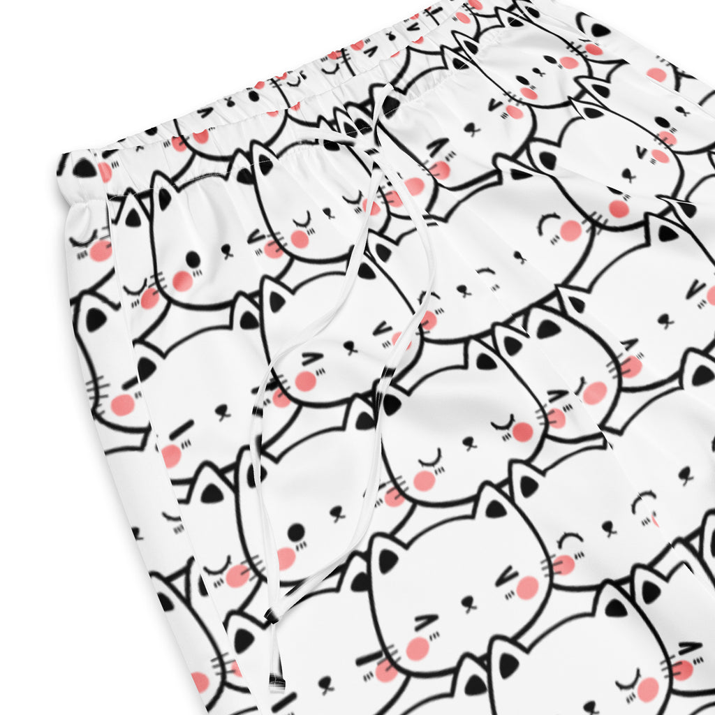 Women’s white lightweight pajama pants with black outlined cartoon cats and pink blush cheeks, drawstring waist